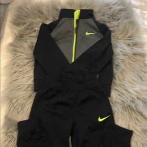 Black and neon track suit
